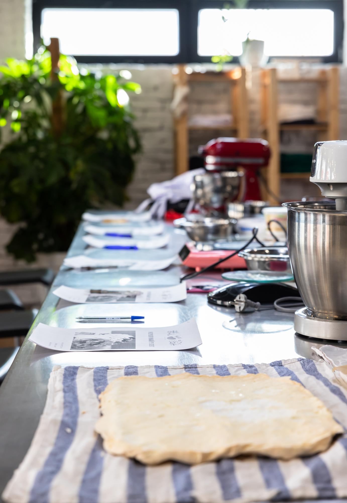 Workshop table with ingredients laid out in modern studio